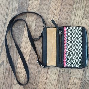 The Sak tan/black leather & woven crossbody bag